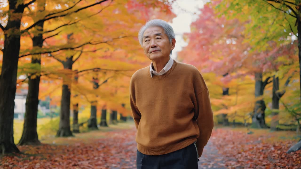 Senior man enjoying autumn in the park