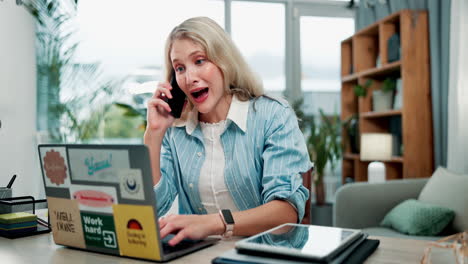 woman working from home and talking on the phone