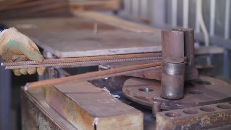 bending metal reinforcement. cutting metal fittings. cutting metal rods. construction. metal cutting.