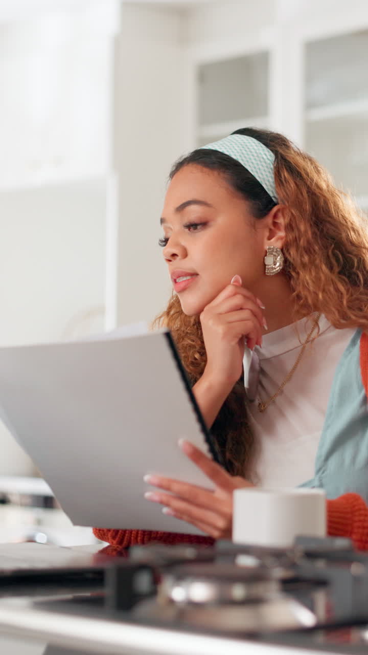 Young Woman Reading Documents and Thinking While Working