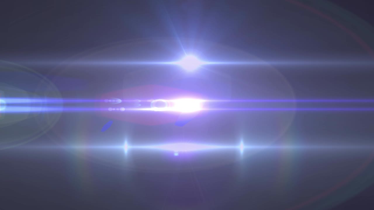 animación de haces de luz que se mueven sobre un fondo oscuro