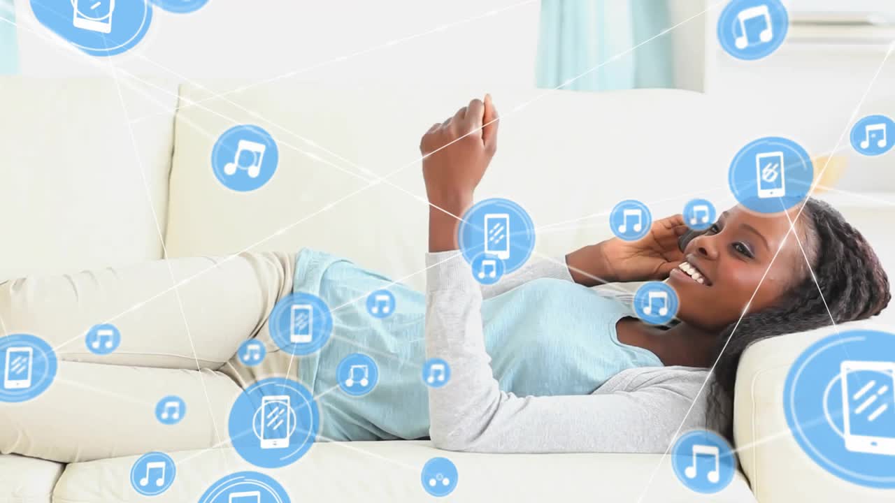 Animation of network of connections over african american woman talking on smartphone
