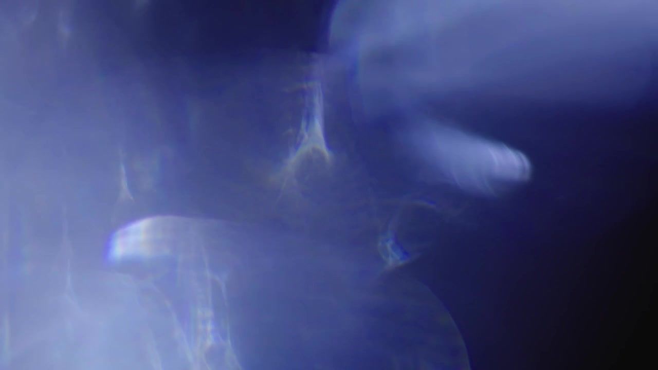 Dynamic Blue and Purple Optical Light Leaks Overlay