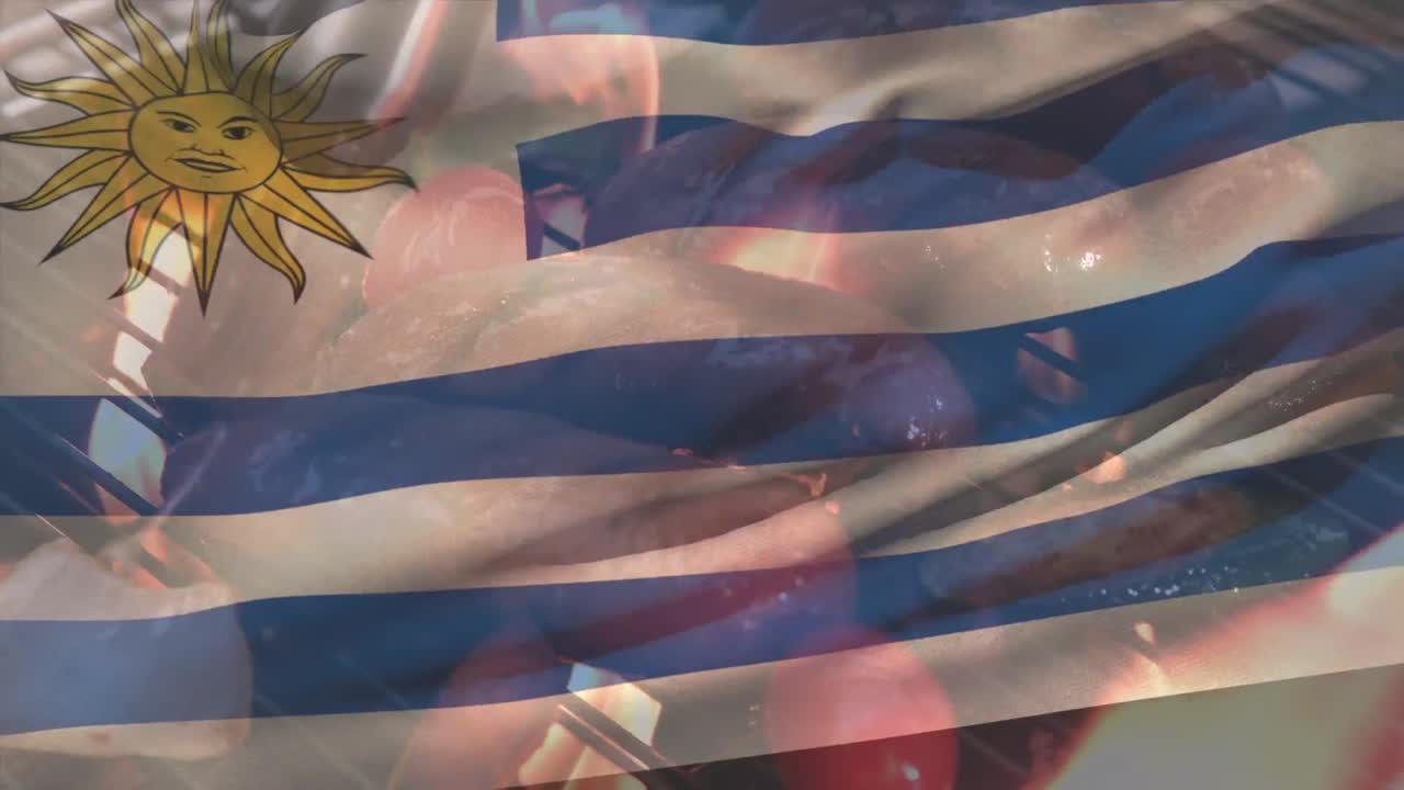 우루과이 국기가 바베큐 그릴에서 요리하는 소시지와 채소 위에 흔들리는 애니메이션