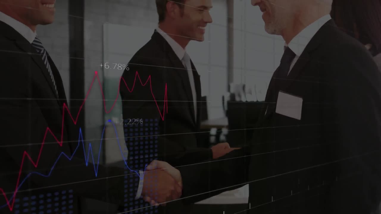 Statistical data processing against two businessmen shaking hands at office