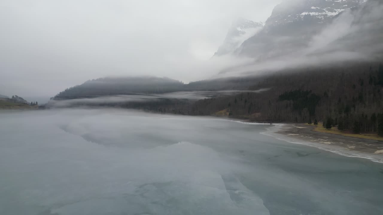 Klöntalersee Glarus Switzerland flight through misty lake scene perfect for time lapse
