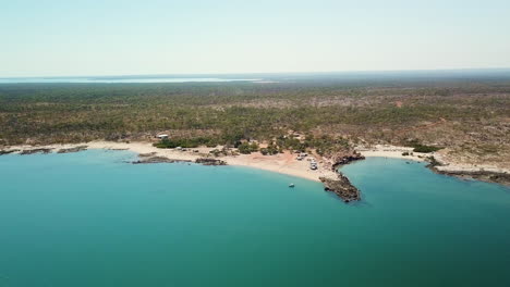 Wide-aerial-pan,-remote-campsite-on-North-Kimberley-Coast,-Western-Australia