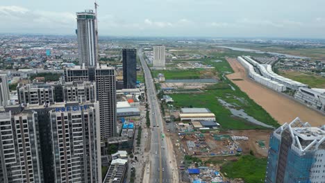 outside phnom penh capital city of cambodia, aerial over road infrastructure