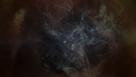 Colorful-liquid-explodes-in-nebula-pattern-in-dark-space,-abstract