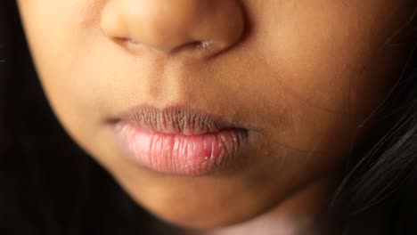 close-up of a child's face and mouth