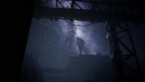 milky way stars above abandoned old fatory