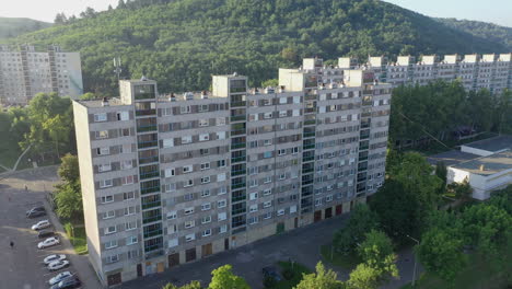 parallax drone shot of suburban buildings in a small town