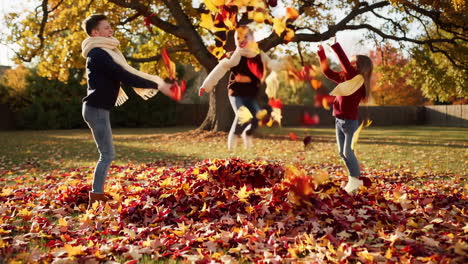 kids playing in a pile of autumn leaves