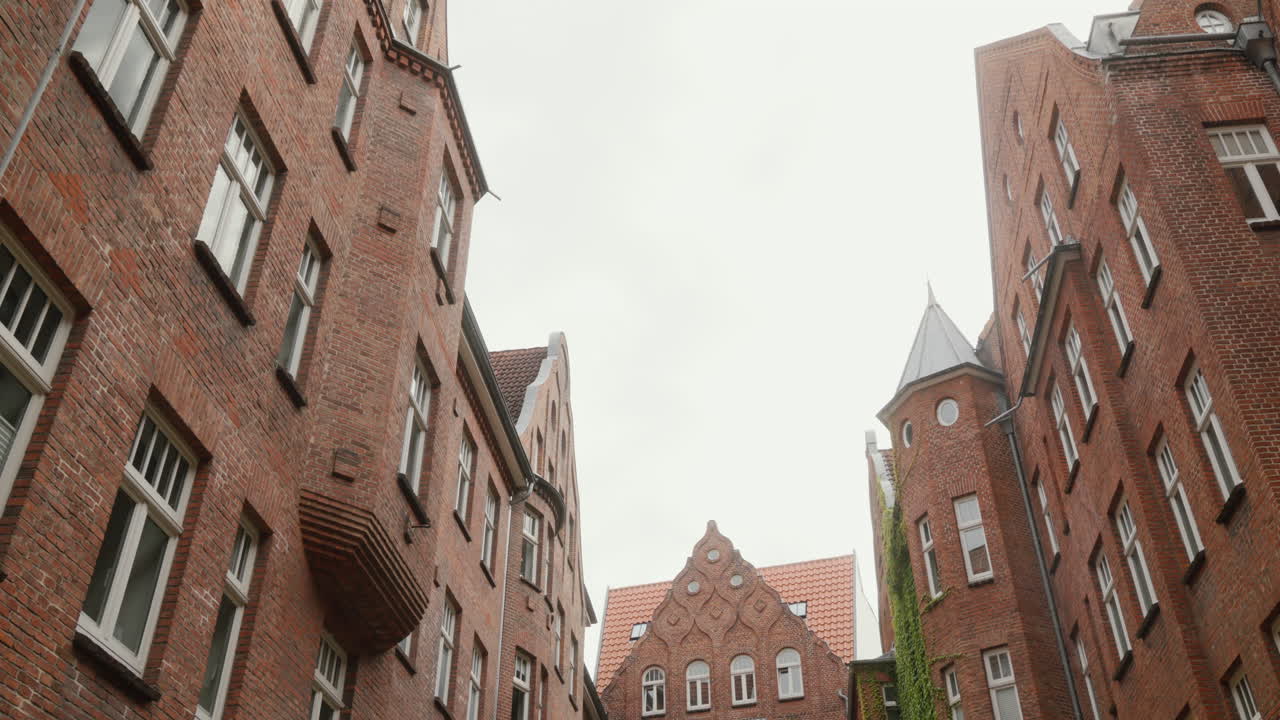 Charming historic brick buildings in Flensburg, Germany. Excellent for travel documentaries.