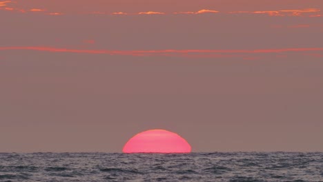 stunning sunset over the ocean with a fishing boat