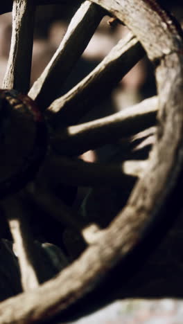 close up of an old wooden wagon wheel