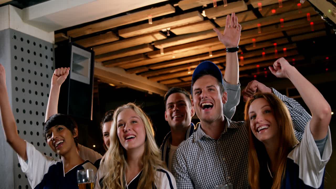 Group of friends watching tv