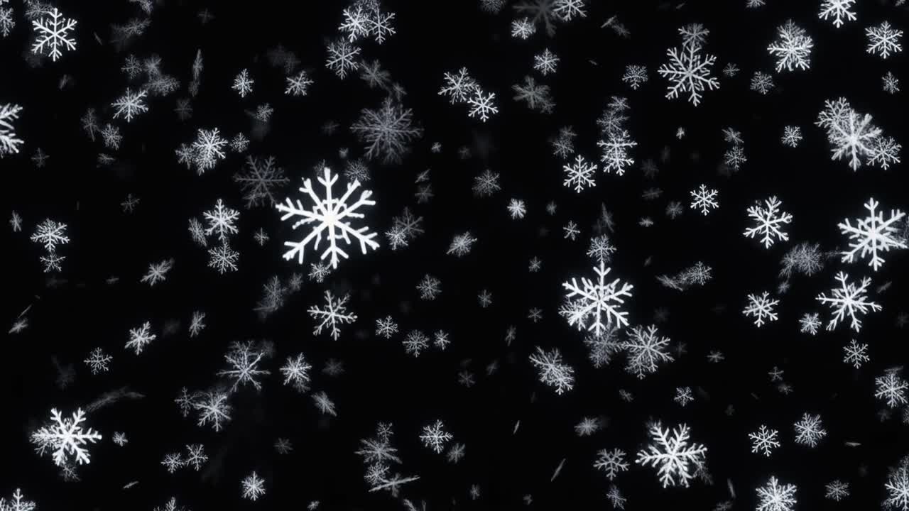 Fallende hvite snøfnugg på svart bakgrunn