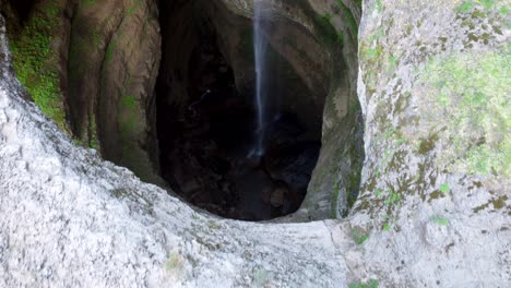 baatara gorge waterfall flowing on the sinkhole, famous natural wonder in tannourine, lebanon