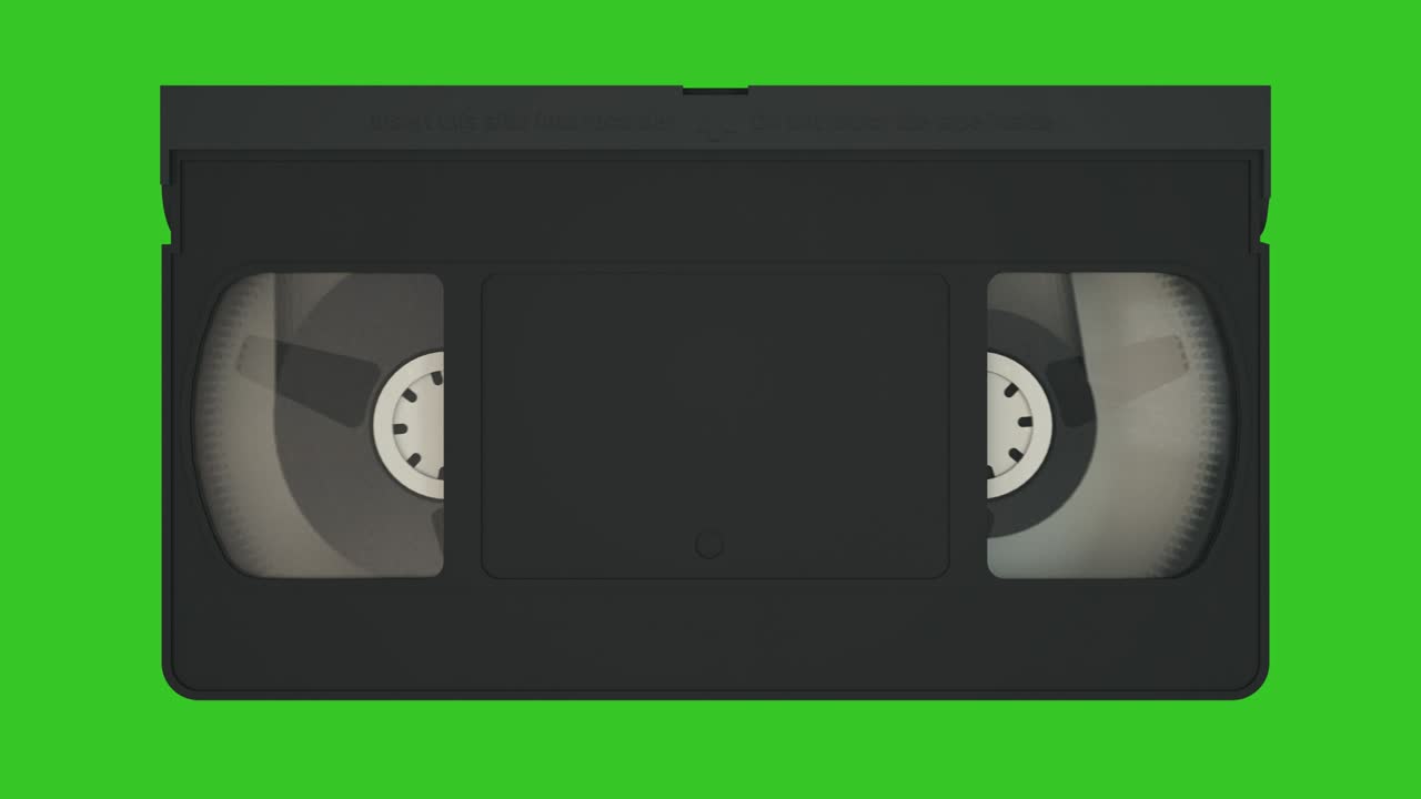 Kaset VHS. Sistem Perekam Pita Video Lama. Kaset Video Terisolasi di Layar Hijau
