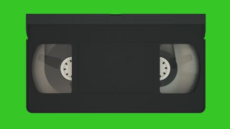 vhs cassette. old video tape record system. video cassette isolated on green screen