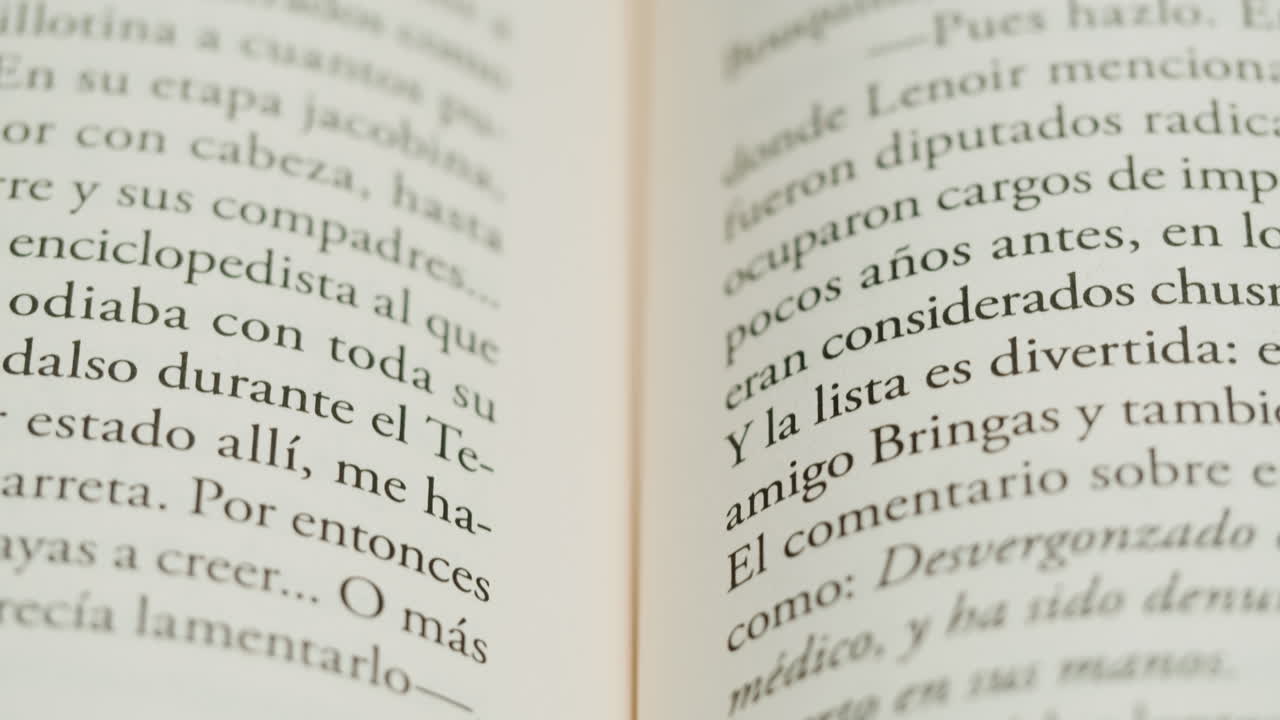 Close-up of a book page with Spanish text