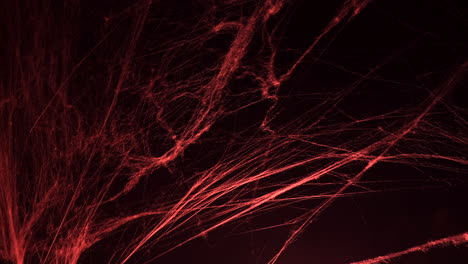 halloween spooky bloody red spider web in the dark