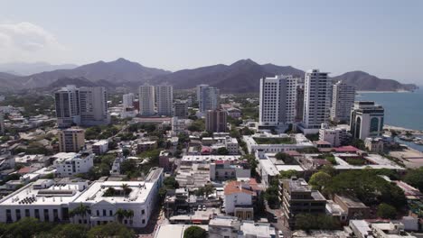 Dolly-backward-establisher-Caribbean-city-Santa-Marta,-Colombia,-sunny-day