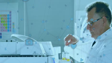 network of connections icons against male scientist working in laboratory