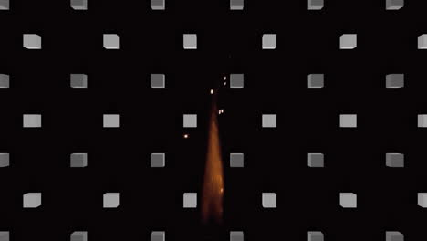 animación de cubos sobre una llama sobre un fondo negro.