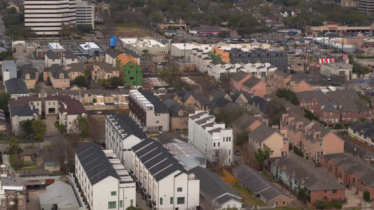 Bird's eye view of a quiet suburban neighborhood with single-family homes in Southwest Houston