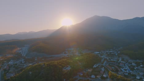 sunrise over a mountain town