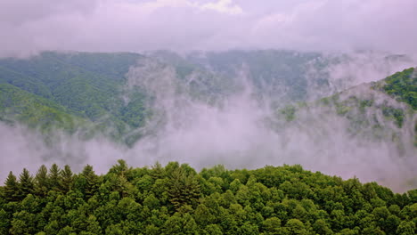 epic drone capture of vapor rising over the smoky mountains