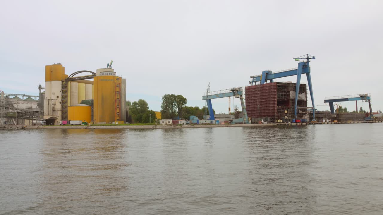Industrial Port On Banks Of Martwa Wisla In Gdansk, Poland. wide shot
