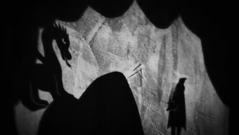 dragon and king shadow puppets in a cave