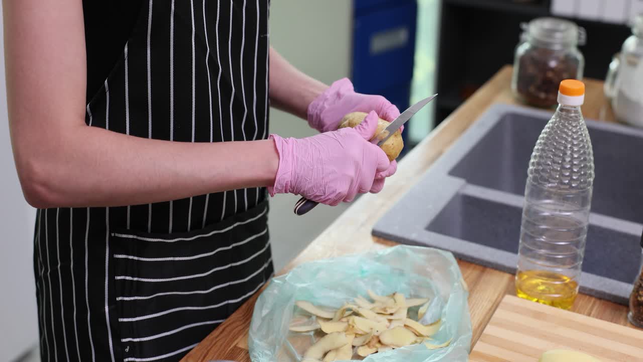 Peeling Potatoes in the Kitchen