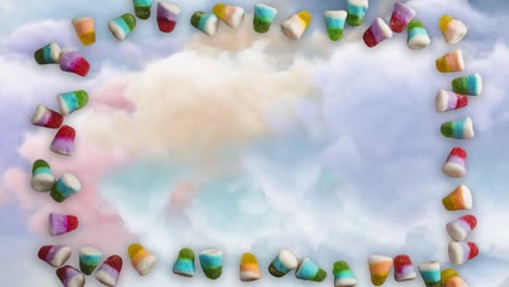 animation of jelly beans frame over cloudy sky