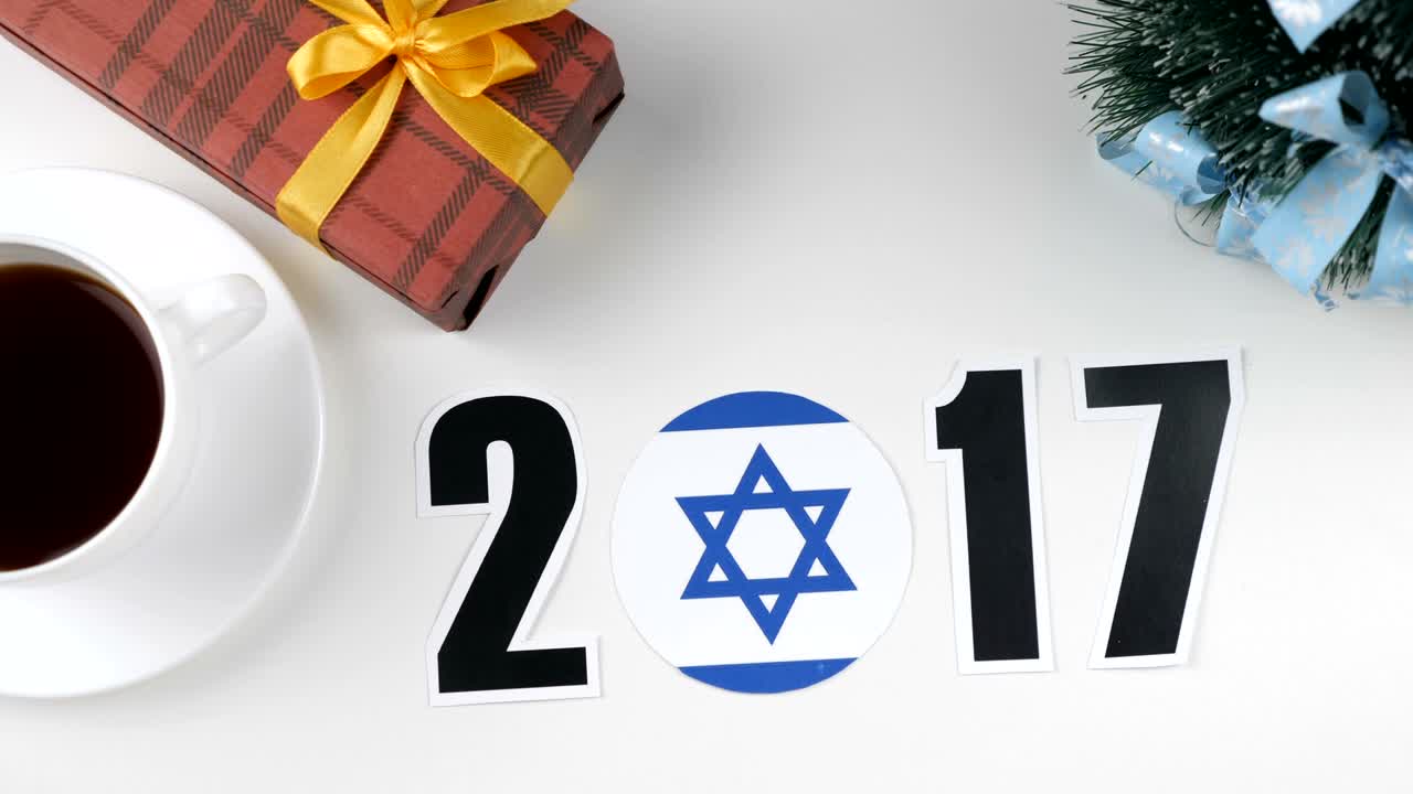 일러스트레이션: 새해, 남성 손, 2017년부터 2018년까지의 해 변경, 이스라엘 발, 컨트리 볼