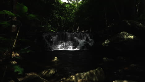 Looking-at-the-waterfall-in-Thailand.