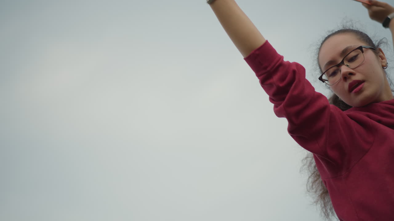 Brave Lady Ascends Boldly Upward, Independent Woman Confidently Elevates Herself To Boundless Heights, Female Strength Propels Her Upward As She Reaches For Infinite Possibilities In Sky