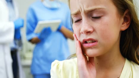 Unhappy-young-patient-having-a-toothache