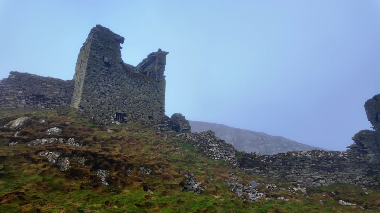 Ruined Irish Castle in rugged West Cork 3 Castles Head remote beauty on a mystical winter afternoon