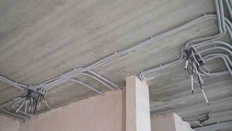 electrical installation of plastic electrification tubes on building site