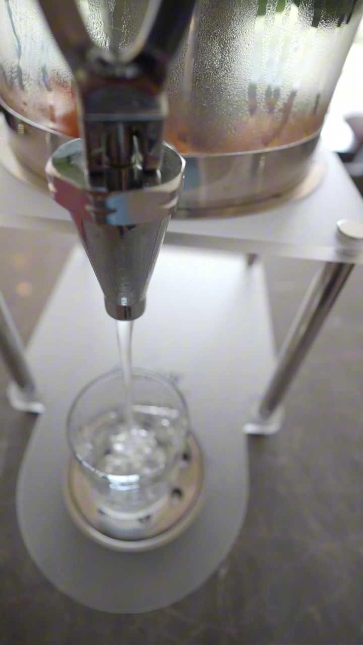 Water Dispensing from a Beverage Dispenser into a Glass