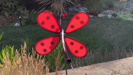 spinning garden windmill toy shot from behind