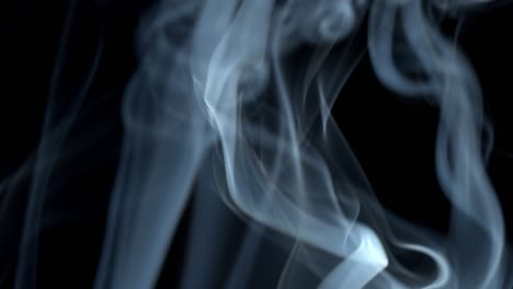 jet of smoke on black background.