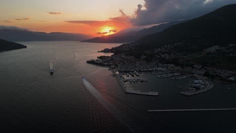 boats in kotor bay, sunset over marina at portonovi in montenegro
