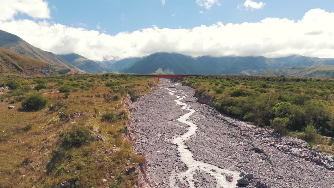 Aerial View of a River in a Mountain Valley