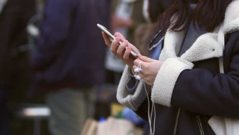 Young-Woman-Using-Smart-Phone