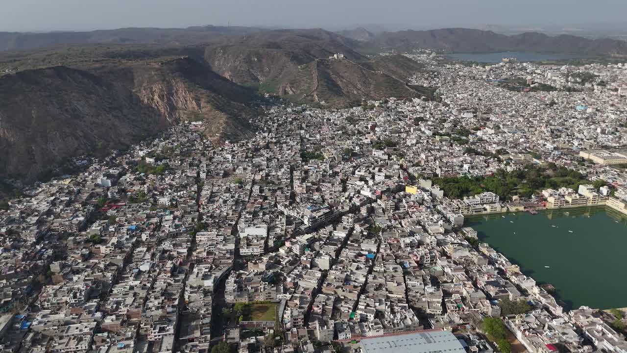 Overhead shot capturing the expansive mountain range surrounding Jaipur.